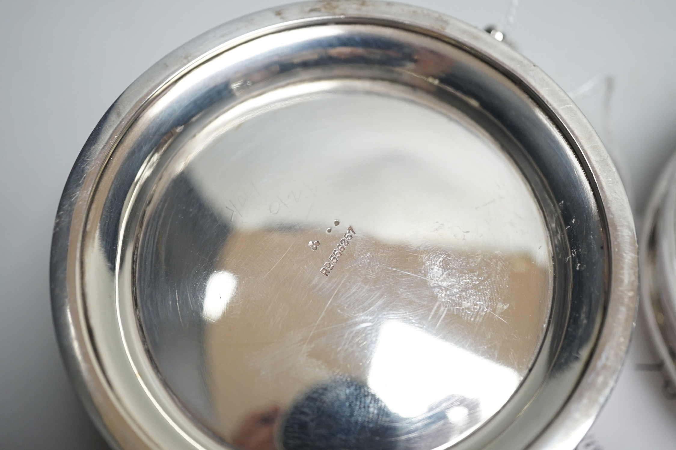 An Edwardian repousse silver shallow bowl, Birmingham, 1901, 16.1cm, together with a modern silver toilet jar and a 1920's silver two handled small bowl, 14.9oz.